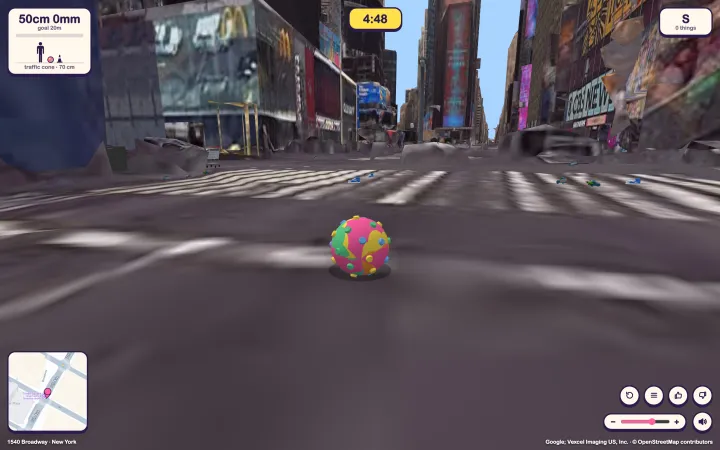 A 50 cm ball on the asphalt of Times Square between the billboards, with the size gauge, timer, compass and minimap around the edge
